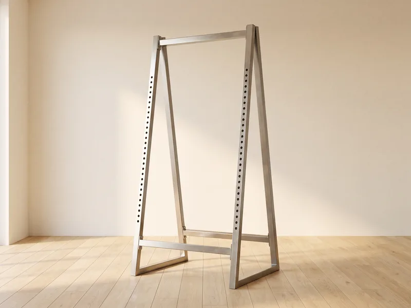 A tall adjustable steel A-frame rig with visible height adjustment holes