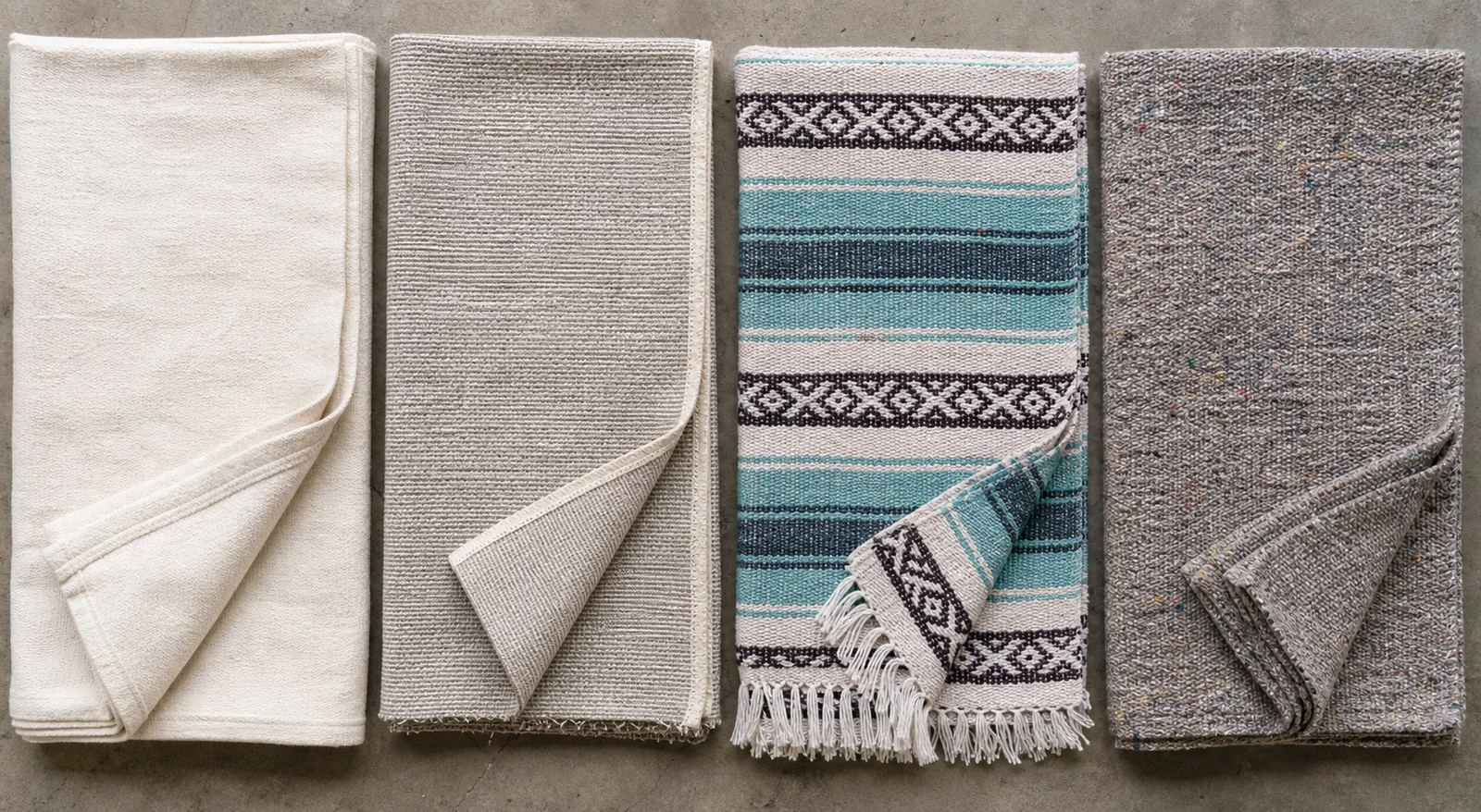 Top-down photograph comparing brushed cotton, flat cotton, fringed Mexican-style blend and dense recycled-fiber yoga blanket constructions